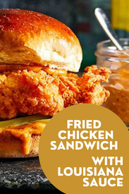 fried chicken sandwich image with text that reads Fried Chicken Sandwich with Louisiana Sauce